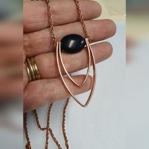 Rose gold tone necklace with pendant